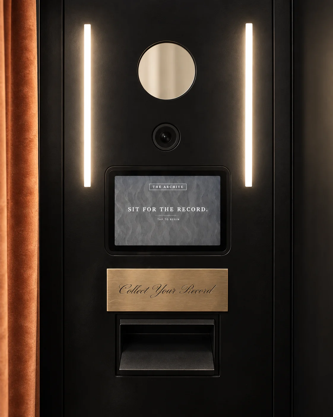 The Archive portrait panel with mirror, lens, screen, and print outlet beneath the Collect Your Record brass label